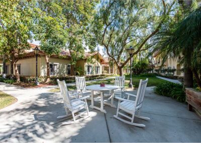 Backyard with white table and chairs